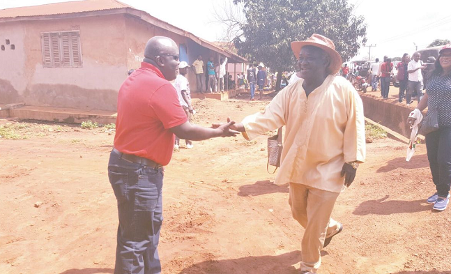  Mr Julius Debrah (left), the Chief of Staff,  welcoming Prof. Kwamena Ahwoi when he joined the NDC mini-durbar at Kranka in the Brong Ahafo Region